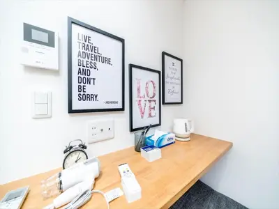 a room with a desk with a phone on it at Maison de Takinogawa - Vacation STAY 16165 in Tokyo