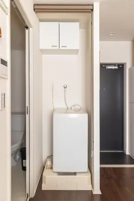 a bathroom with a sink and a toilet at Float Inn Asakusa in Tokyo