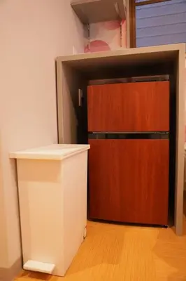 a closet with a wooden door in a room at \u53f0\u6771\u533a\u6d45\u8349\u3082\u3059\u3050,\u6700\u592710\u540d\u8cb8\u52073\u968e\u5efa\u3066,\u30b9\u30ab\u30a4\u30c4\u30ea\u30fc\u307e\u3067\u5f92\u6b6910\u5206,\u5168\u5ba4Chromecast\u5b8c\u5099,WonderfulStayTOKYO SKYTREE in Tokyo