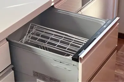an open refrigerator with an empty drawer in a kitchen at Residencial Voyan \u5357\u7802\u753a in Tokyo