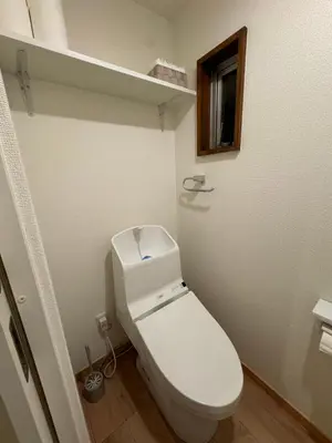 a bathroom with a white toilet in a room at waseda house in Tokyo