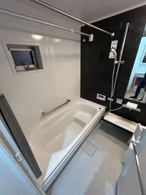 a white bath tub in a bathroom with a window at Bisk Park Higashijujo - Vacation STAY 83637v in Tokyo