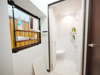 a bathroom with a toilet and a sink at 7\u6642IN19\u6642OUT # \u6c60\u888b\u738b\u5b50\u8d64\u7fbd\u99c5\u7121\u6599\u9001\u8fce # \u30c6\u30e9\u30b9\u30cf\u30a6\u30b9 # \u99c5\u8fd110\u5206 # \u4e0a\u91ce\u99c5\u96fb\u8eca12\u5206 # \u6700\u59277\u540d # 7 00 IN19 00 OUT # Free pick-up at Ikebukuro, Oji, and Akabane Stations # Terrace House # 10 min to station # 12 min to Ueno # Max 7 in Tokyo