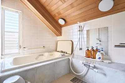 a bathroom with a tub and a sink at L-Large 3Bedroom Luxury Condo, 140sqm Max 19 PPL, 7mins walk to station, Elevator,QuiteArea in Tokyo
