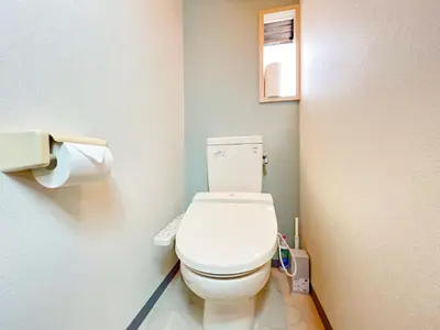 a bathroom with a white toilet in a room at East Ikebukuro Living&Bed Sunshine City in Tokyo