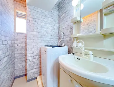 a bathroom with a toilet and a sink at East Ikebukuro Living&Bed Sunshine City in Tokyo