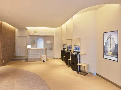 a waiting area in a dental clinic with machines at Mitsui Garden Hotel Ginza Tsukiji in Tokyo