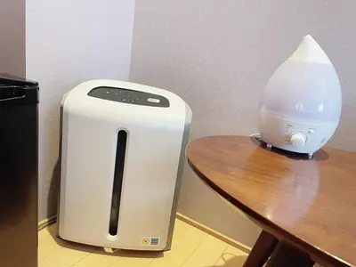 a white toaster sitting on top of a wooden table at Light Hotel - Vacation STAY 91078v in Tokyo