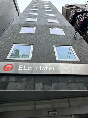 a building with a sign on the side of it at ELE Hotel \u6771\u65e5\u672c\u6a4b in Tokyo