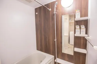 a bathroom with a sink and a bath tub at The most comfortable and best choice for accommodation in Yoyogi SoSI in Tokyo