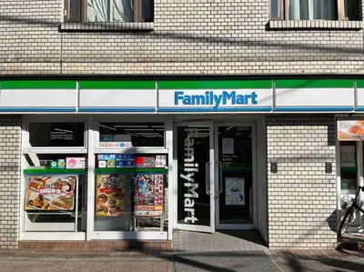 a familymart store with its door open in a building at \u30a2\u30f3\u30c9\u30b9\u30c6\u30a4\u6c60\u888b4\u4e01\u76ee502 in Tokyo