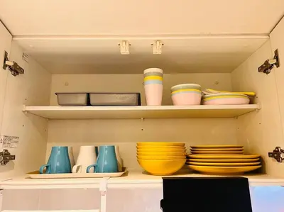 a shelf filled with bowls and plates and bowls and plates at \u30a2\u30f3\u30c9\u30b9\u30c6\u30a4\u58a8\u75303\u4e01\u76ee in Tokyo