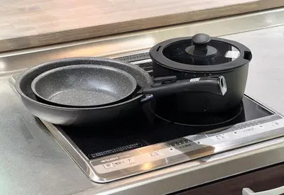 a pot sitting on top of a stove at NEXUS HOTEL Gotanda in Tokyo