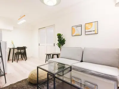 a living room with a couch and a table at Oyama pantheon in Tokyo