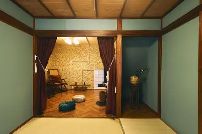 a room with a door open to a living room at Retro Style Japanese House 10-min walk to Asakusa in Tokyo