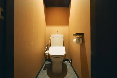 a bathroom with a white toilet in a room at Retro Style Japanese House 10-min walk to Asakusa in Tokyo