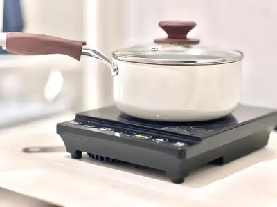 a pot sitting on top of a stove at ANX Hostel-AD0080 in Tokyo