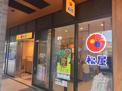 a store with signs in the window of a building at Tokyo House2 Best location in JUJO 2minutes walk to JR Jujo station in Tokyo