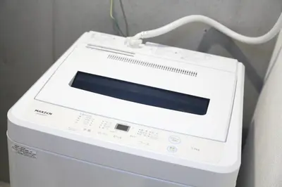 a white device sitting on top of a washing machine at [Newly built condominium for rent! ] 5 minutes wal - Vacation STAY 98059v in Tokyo
