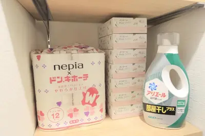 a shelf with boxes and a bottle of detergent at 4min walk to JR Yoyogi Sta 8min to Shinjuku MGW in Tokyo