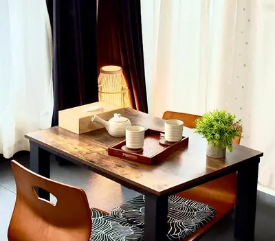 a table with a box and a plant on it at Arche de Reve in Tokyo