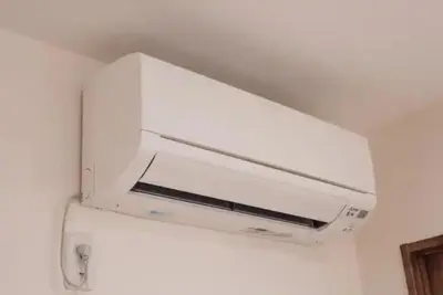 a white microwave oven hanging from a ceiling at 2, Nerima, 1st floor apartment, \u7df4\u99ac in Tokyo