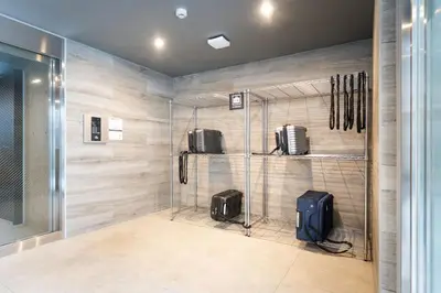 a room with a bunch of suitcases on display at MINI HOUSE Tokyo South in Tokyo