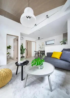 a living room with a couch and a table at \u3077\u3075\u304b\u6771\u5411\u5cf6 in Tokyo
