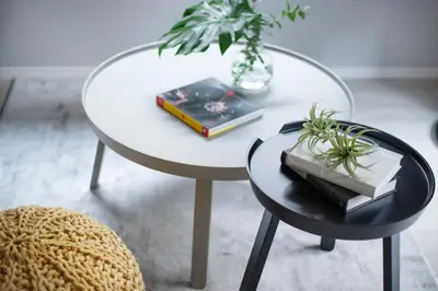 a white table with books and plants on top of it at \u3077\u3075\u304b\u6771\u5411\u5cf6 in Tokyo