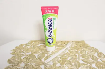 a tube of toothpaste sitting on top of a table at PokaPoka Stay Shinkoiwa R in Tokyo