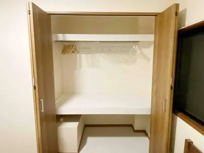 an empty closet with a door open and a tv at SunStay Tachiaigawa 2 in Tokyo