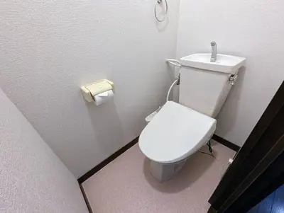 a bathroom with a white toilet in a stall at Home cruise\u843d\u5408\u5357\u9577\u5d0e in Tokyo