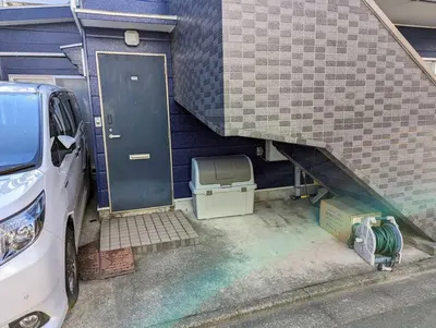 a van parked in front of a house with a door at Home cruise\u843d\u5408\u5357\u9577\u5d0e in Tokyo