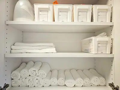 a closet filled with lots of white towels at 603 Koiwa Disneyland Airport direct bus in Tokyo