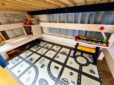 a play room with a keyboard on a floor at 603 Koiwa Disneyland Airport direct bus in Tokyo