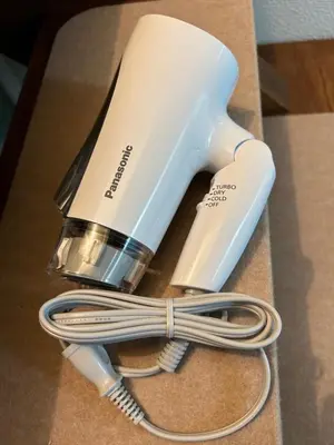 a hairdryer and a hair dryer on a table at LUANAHOTEL IN KOUENJI in Tokyo