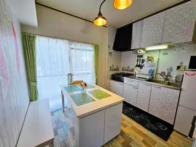 a kitchen with a sink and a counter top at 703. Disneyland, direct bus to the airport/1minute's walk from the station. in Tokyo