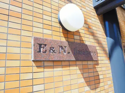 a sign on the side of a building at \u685c\u306e\u5ddd12 \u6c60\u888b\u99c5 7\u5206 2-5\u4eba\u4e28Ikebukuro 7 minutes 2-5 people in Tokyo