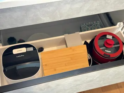 a drawer with a toaster and other items in it at Sky Terrace \u65b0\u7bc9\u72ec\u680b\u6238\u5efa \u9633\u5149\u9732\u53f0\u89c2\u666f\u5929\u7a7a\u6811 in Tokyo