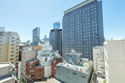 an aerial view of a city with tall buildings at Shinjuku Kabukicho Designer's Apartment III in Tokyo