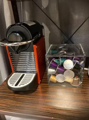 a toaster sitting on top of a table at \u30a2\u30f3\u30c9\u30b9\u30c6\u30a4\u65b0\u5bbf7\u4e01\u76ee in Tokyo