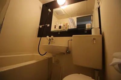 a bathroom with a toilet and a sink and a tub at \u3010 \u30c7\u30a3\u30ba\u30cb\u30fc\u3078\u697d\u3061\u3093\u306a\u90e8\u5c4b\u3011\u8eca\u306711\u5206\uff0a\u30b3\u30f3\u30d3\u30cb\u3042\u308a\uff01\u6771\u4eac\u30e1\u30c8\u30ed\u845b\u897f\u99c5\u304b\u3089\u5f92\u6b695\u5206\uff01 in Tokyo