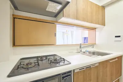 a kitchen with a stove and a sink at K-Large balcony, Luxury 2Bedroom Condo, 101sqm,Max14 PPL,7mins walk to station, Elevator,QuiteArea in Tokyo
