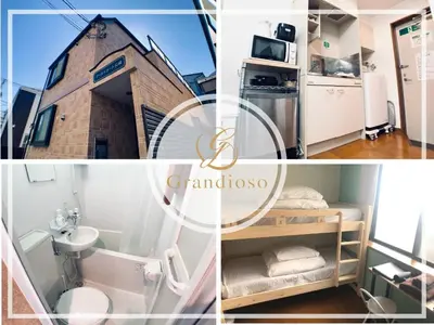 a collage of photos with a bathroom and a building at East Court Nagasaki - Vacation STAY 13035 in Tokyo