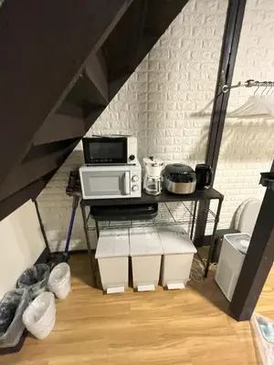 a microwave oven sitting on a table in a kitchen at Shibuya-ku - House - Vacation STAY 8663 in Tokyo