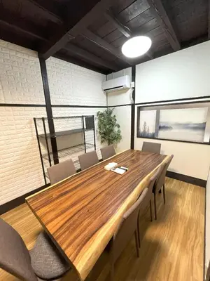 a conference room with a wooden table and chairs at Shibuya-ku - House - Vacation STAY 8663 in Tokyo