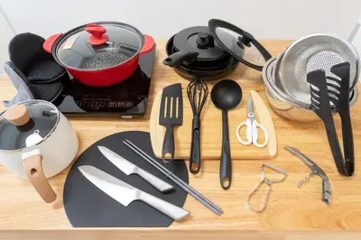 a table with kitchen utensils on a table at 