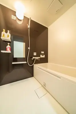 a bathroom with a bath tub and a shower at 87, Senzoku, Detached house for rent, \u5343\u675f in Tokyo
