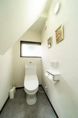 a bathroom with a toilet and a window at 87, Senzoku, Detached house for rent, \u5343\u675f in Tokyo
