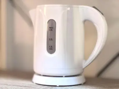 a white jug with a thermometer on a table at JUN shinjuku408-SJ0099 in Tokyo